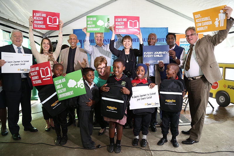 Partners celebrated the launch with students, who received backpacks with reflective strips to increase visibility on the roads.