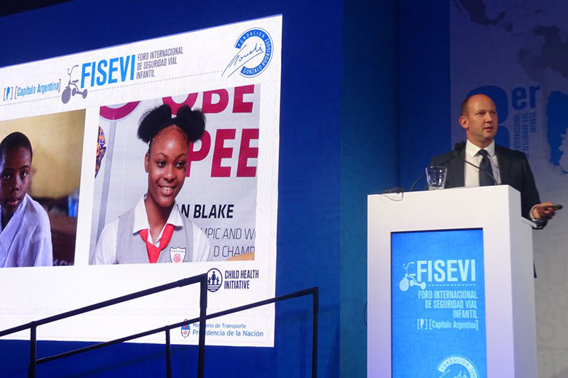 FIA Foundation Deputy Director Avi Silverman opens the session on safe school zones by sharing the personal stories of Celia and Nneka who were hit by vehicles near their school. 