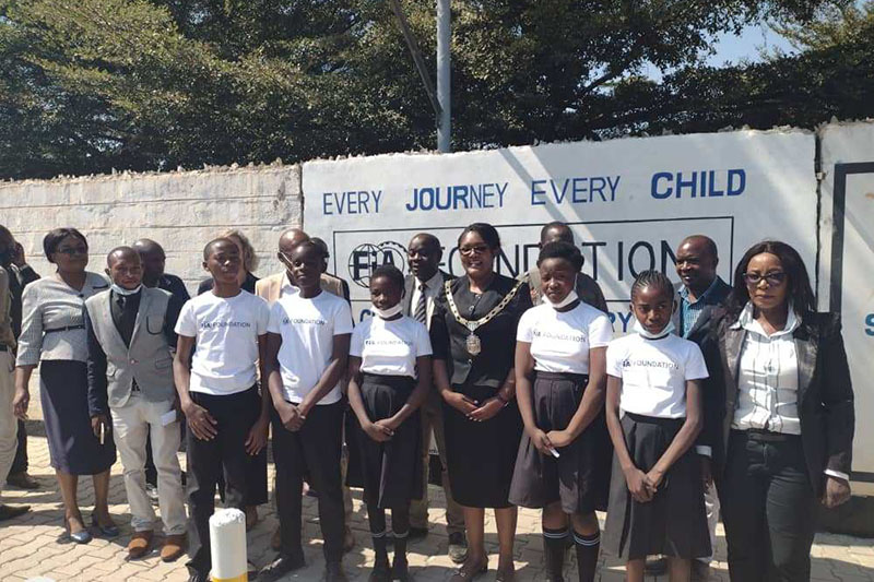 Mayor Mwaya with students from Chimwemwe Secondary School.